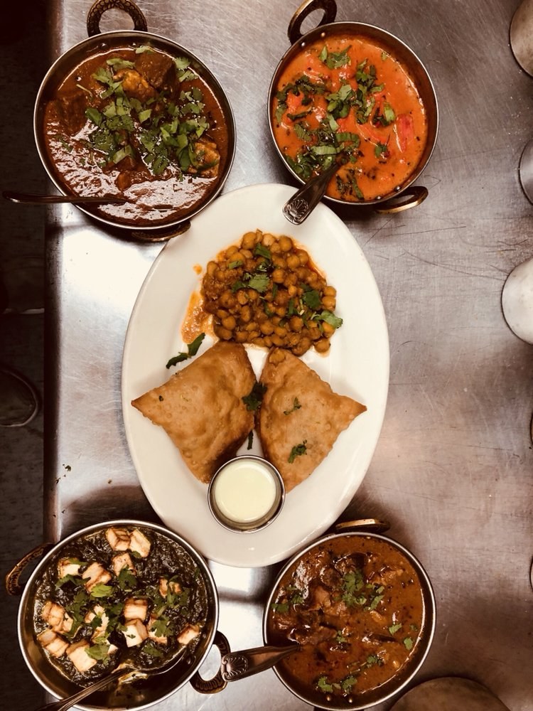 A full spread of curries, samosas and chana at Shyan's Kitchen
